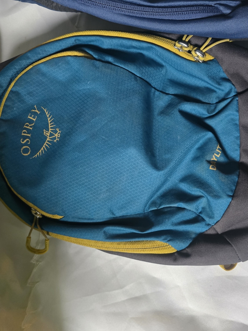 OSPREY Teal Backpack with Yellow Accents